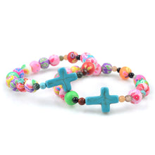 Load image into Gallery viewer, Floral Softened Clay Bead Cross Bracelet
