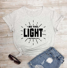 Load image into Gallery viewer, Be The Light Matthew 5:14 Tshirt
